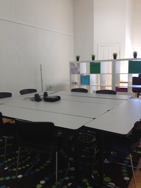 "The Corral" Conference table. Complete with Projector and Speakers.